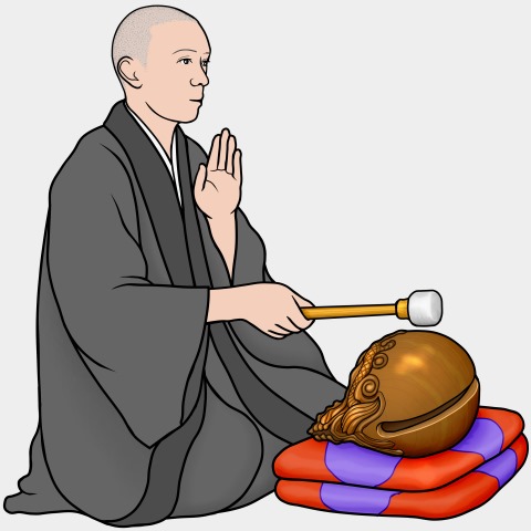 木魚を叩く僧侶